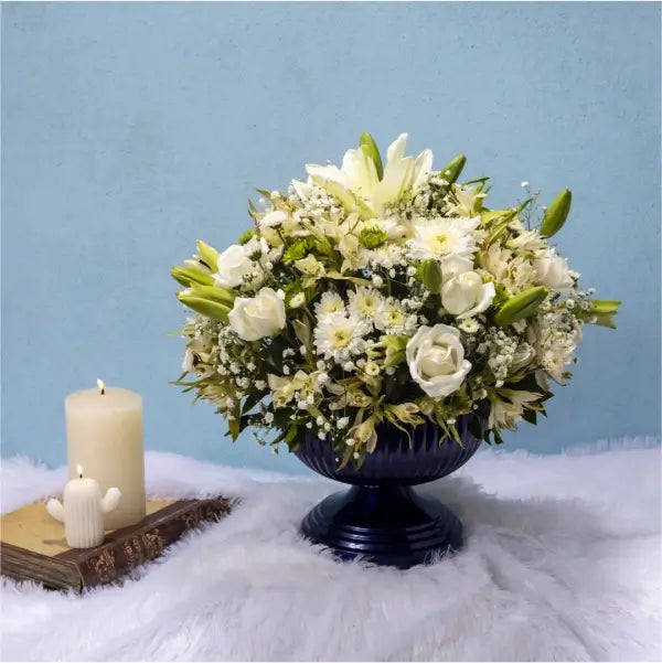 flower vase arrangement of asiatic lily white chrysanthemum front view