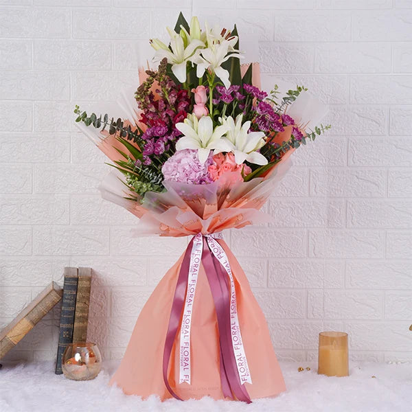 flower bouquet of lilies chrysanthemums hydrangeas and roses front view