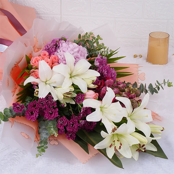 flower bouquet of lilies chrysanthemums hydrangeas and roses top view