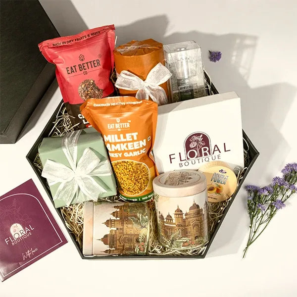 luxury perfume hamper for him with chocolates and snacks top view 2