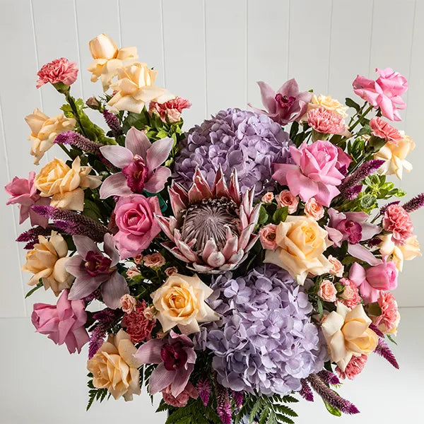 mixed fancy flower vase arrangements closeup view