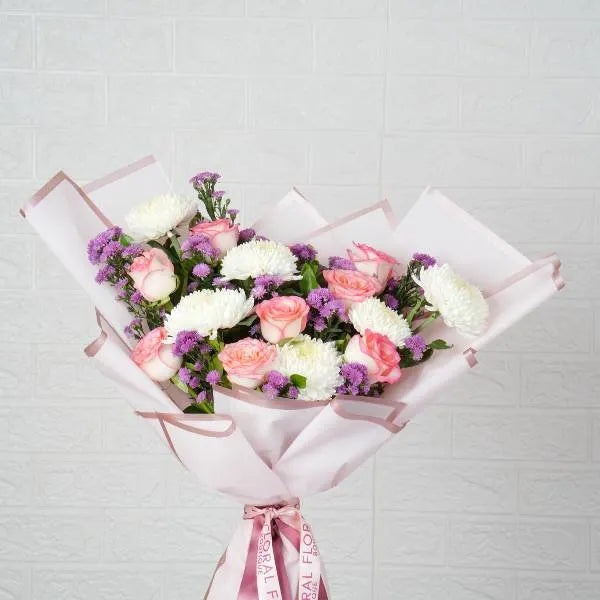 mixed flower bouquet of pink roses white disbuds front view 2
