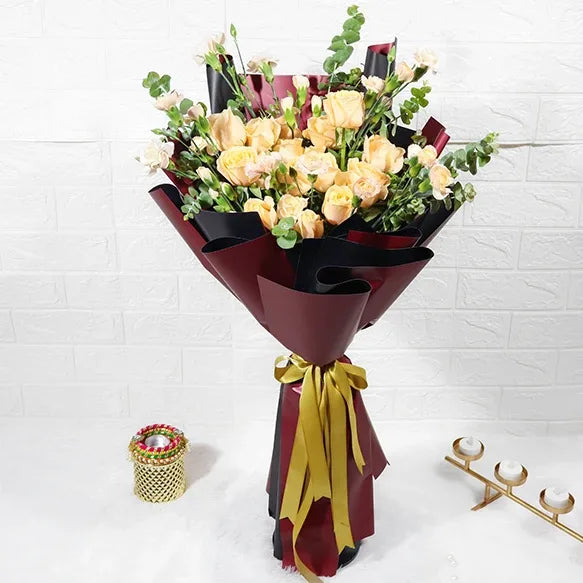 charming peach roses bouquet with spray carnations front view