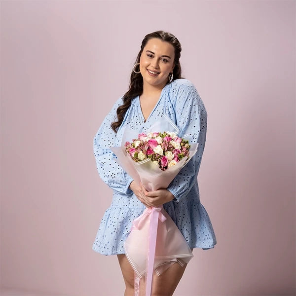 mix flower bouquet of alstroemeria pink white roses pink roses lifestyle view