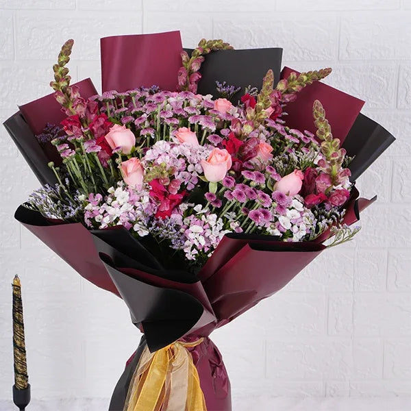 pink flowers bouquet of chrysanthemum baby pink roses pink snapdragon close up view