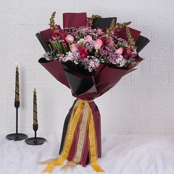 pink flowers bouquet of chrysanthemum baby pink roses pink snapdragon front view