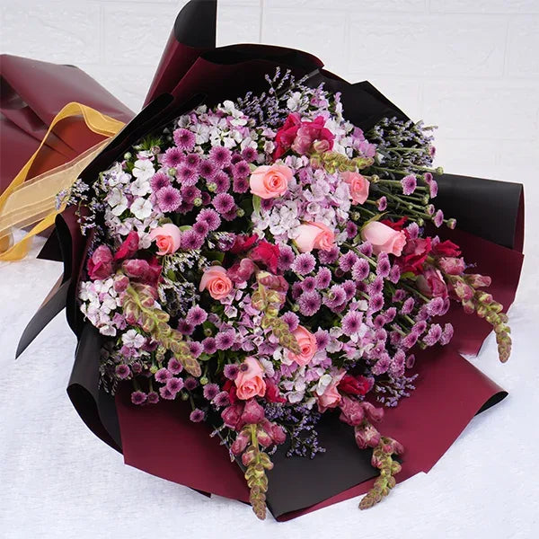 pink flowers bouquet of chrysanthemum baby pink roses pink snapdragon top view
