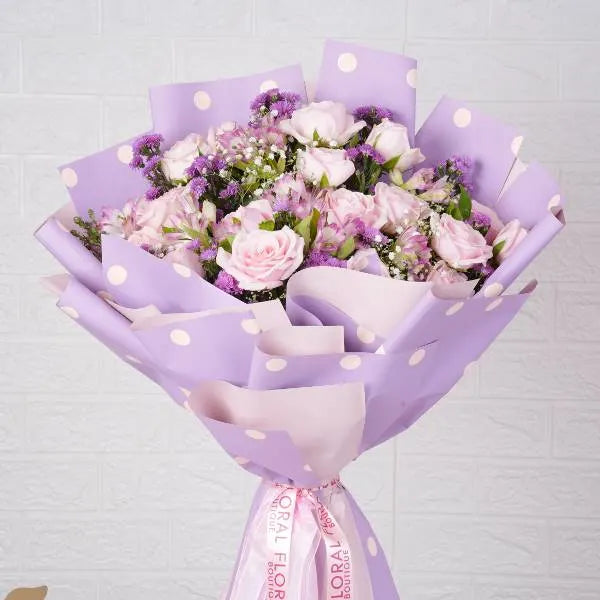 bouquet of pink roses alstroemeria and gypsophila front view 2
