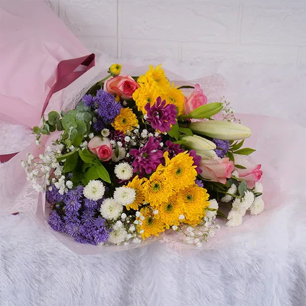 mix flower bouquet with roses and daisy top view