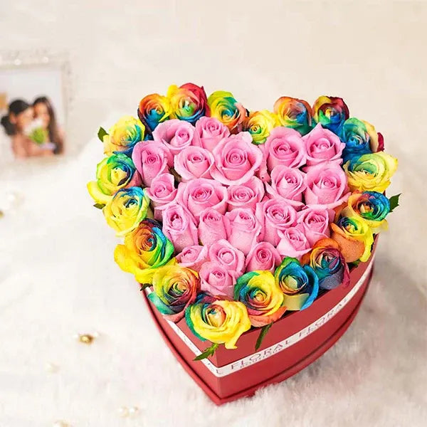 rainbow roses in romantic heart shaped red box close up view 2