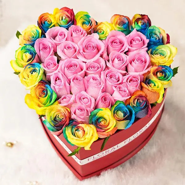rainbow roses in romantic heart shaped red box top view