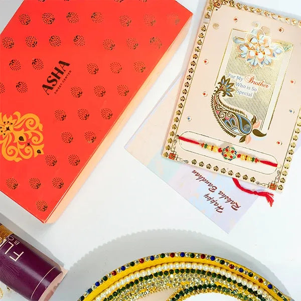 rakhi greeting card set with asha sweets 500g front view