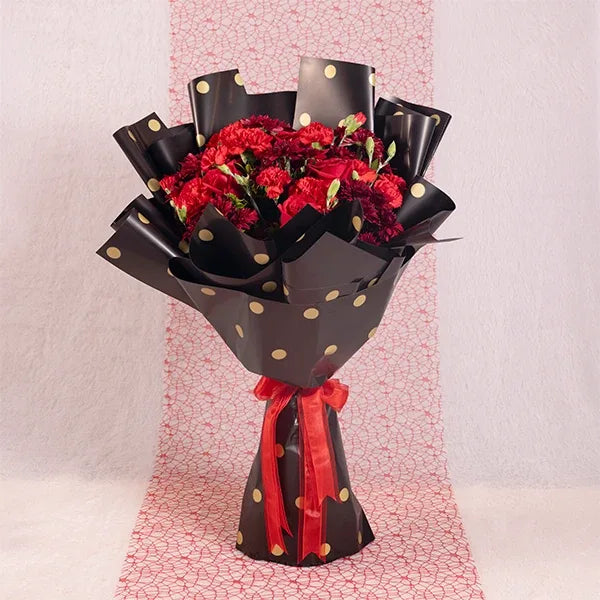 bouquet of red chrysanthemums carnations and roses front view 2