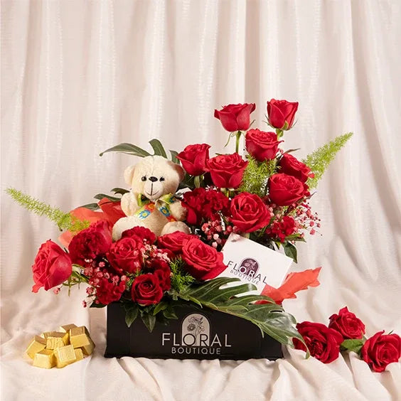 flower box arrangement of red roses celosia red with xanadu front view 2