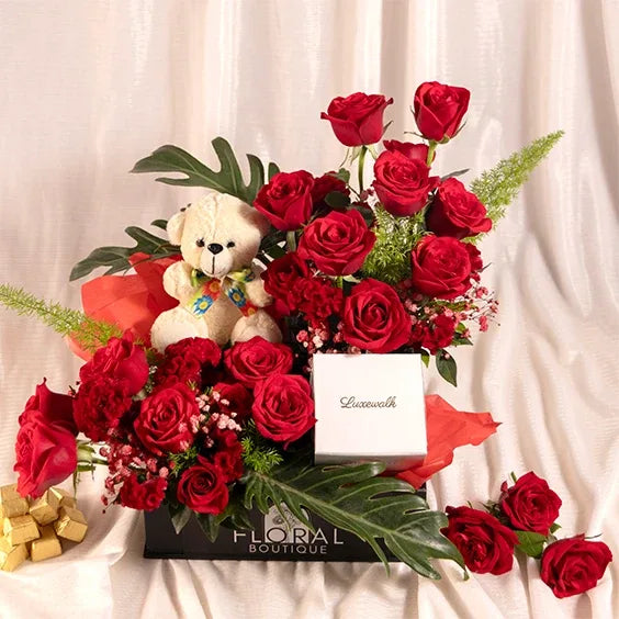 flower box arrangement of red roses celosia red with xanadu front view