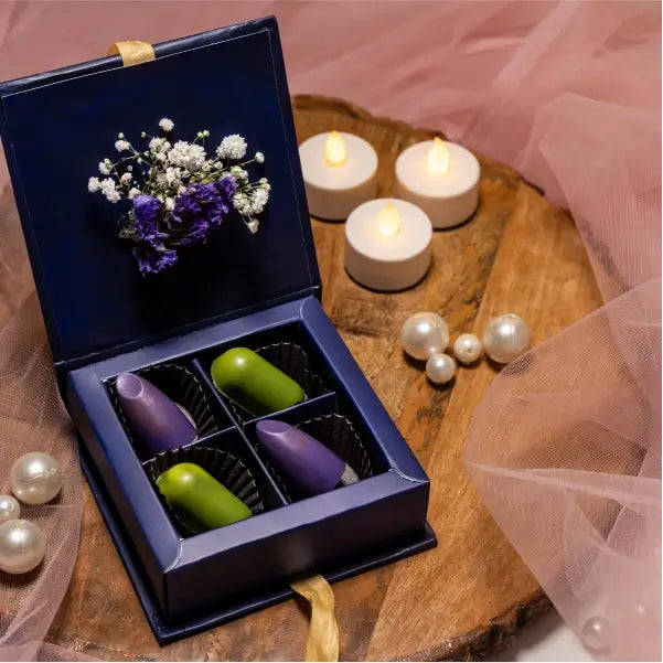 rich cocoa treasures box with capsule chocolates top view