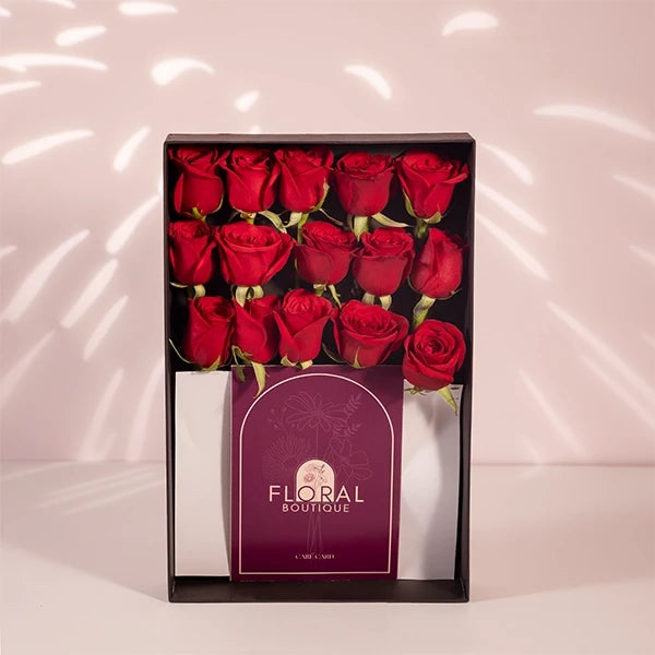 stem dutch roses in a black box front view 2