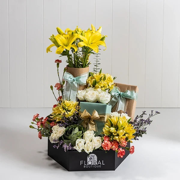 the golden hexagon bloom with white roses handmade chocolates top view