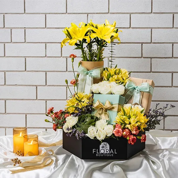 the golden hexagon bloom with white roses handmade chocolates front view