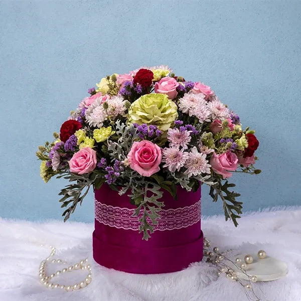revival roses bracika white pink chrysanthemums in a box arrangement front view