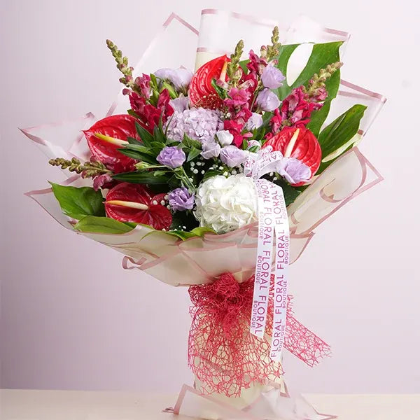 mix flower bouquet of red anthuriums pink hydrangea and snapdragon front view 2