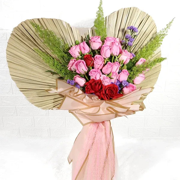 vibrant revival pink roses and red roses bouquet front view 2