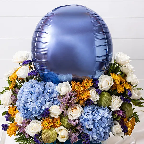 mix flower bouquet of white roses with chrysanthemum blue hydrangea closeup view