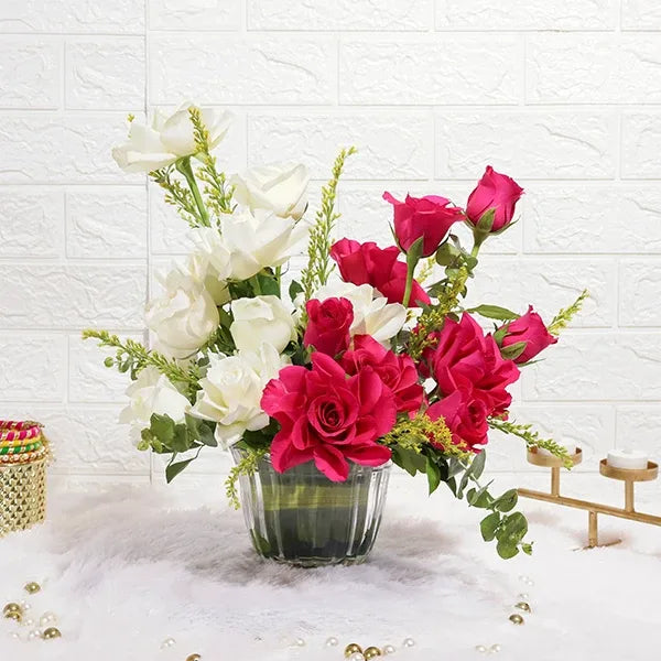 graceful white and dark pink roses in glass vase front view