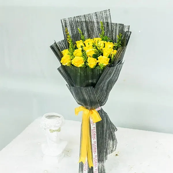 yellow rose bouquet with black wrap front view