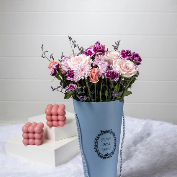 Unwrap a Blush Surprise Our floral box arrangement overflows with a touch of elegant pink