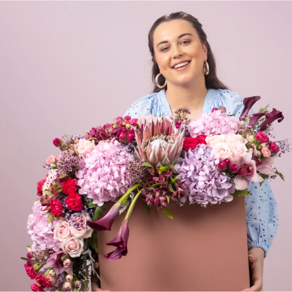 Graceful Blossoms - Pink Bag Floral Arrangement